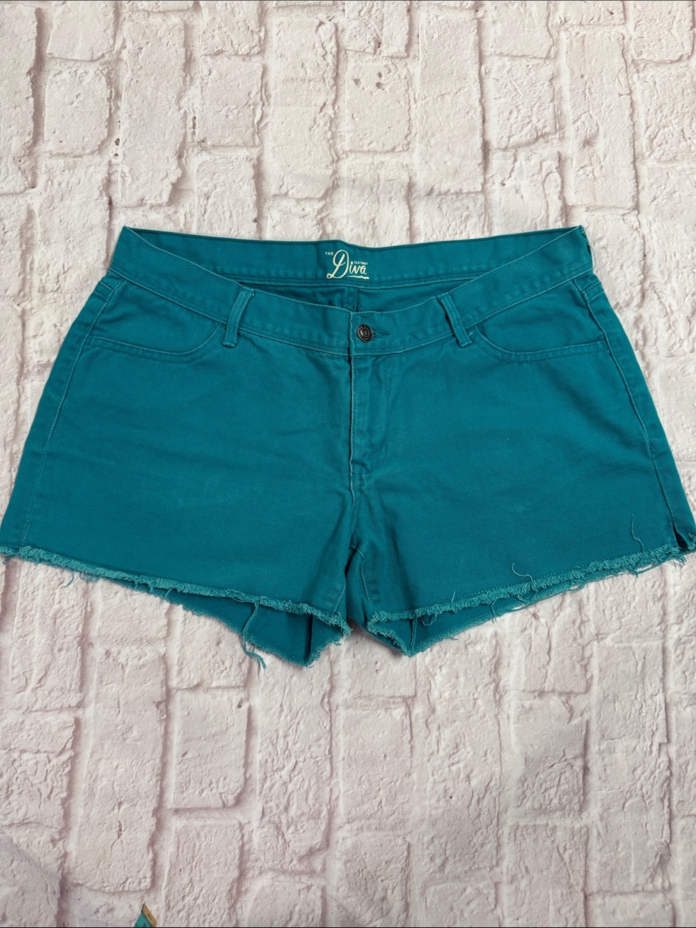 “The Diva” from Old Navy Teal Frayed Hem Denim Shorts